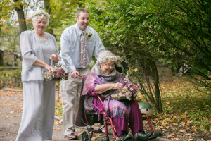 Grandmother as a flower girl in this a fall garden wedding with a brunch reception