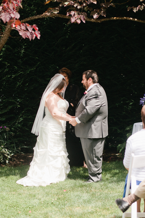 plus size bride in courtyard wedding