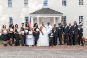 plus size bride, plus size wedding dress, black and white wedding, black bridesmaid gowns
