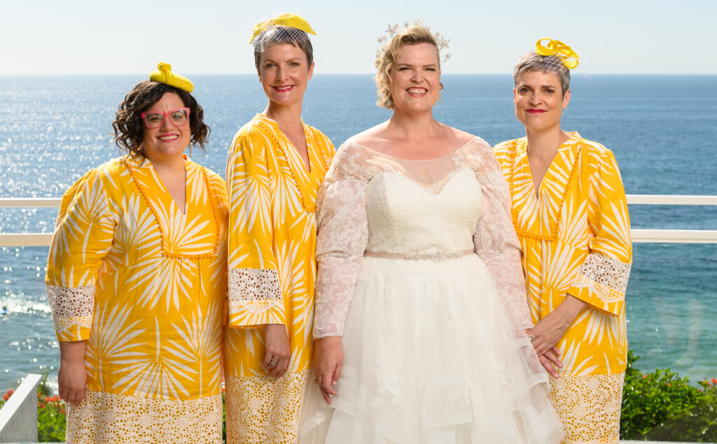 plus size bride, plus size wedding dress, beach wedding, astral queen crown, yellow bridesmaid tunics